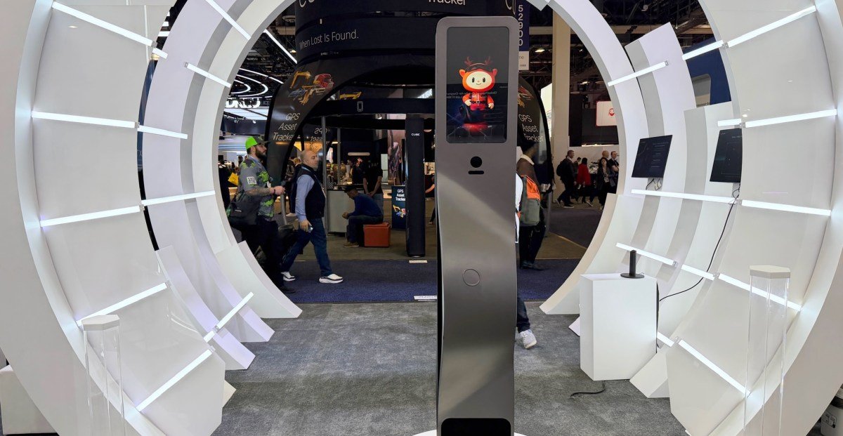 A giant Lockin V7 smart lock on display at CES 2026, showcasing its innovative wireless charging capabilities.