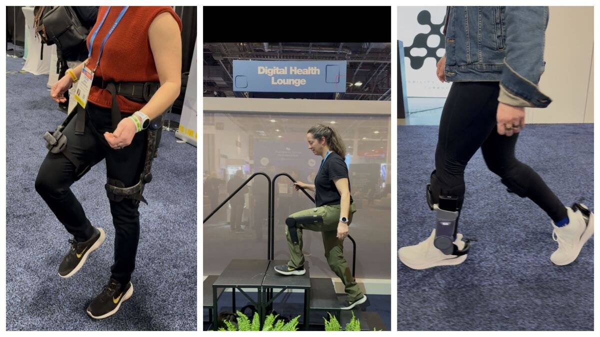 A journalist testing various exoskeletons at the Consumer Electronics Show (CES).
