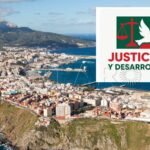 Symbol of the Justice and Development party in Ceuta, featuring a dove of peace and scales of justice in red and green.