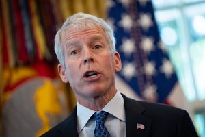 U.S. Energy Secretary Chris Wright speaking at a podium.