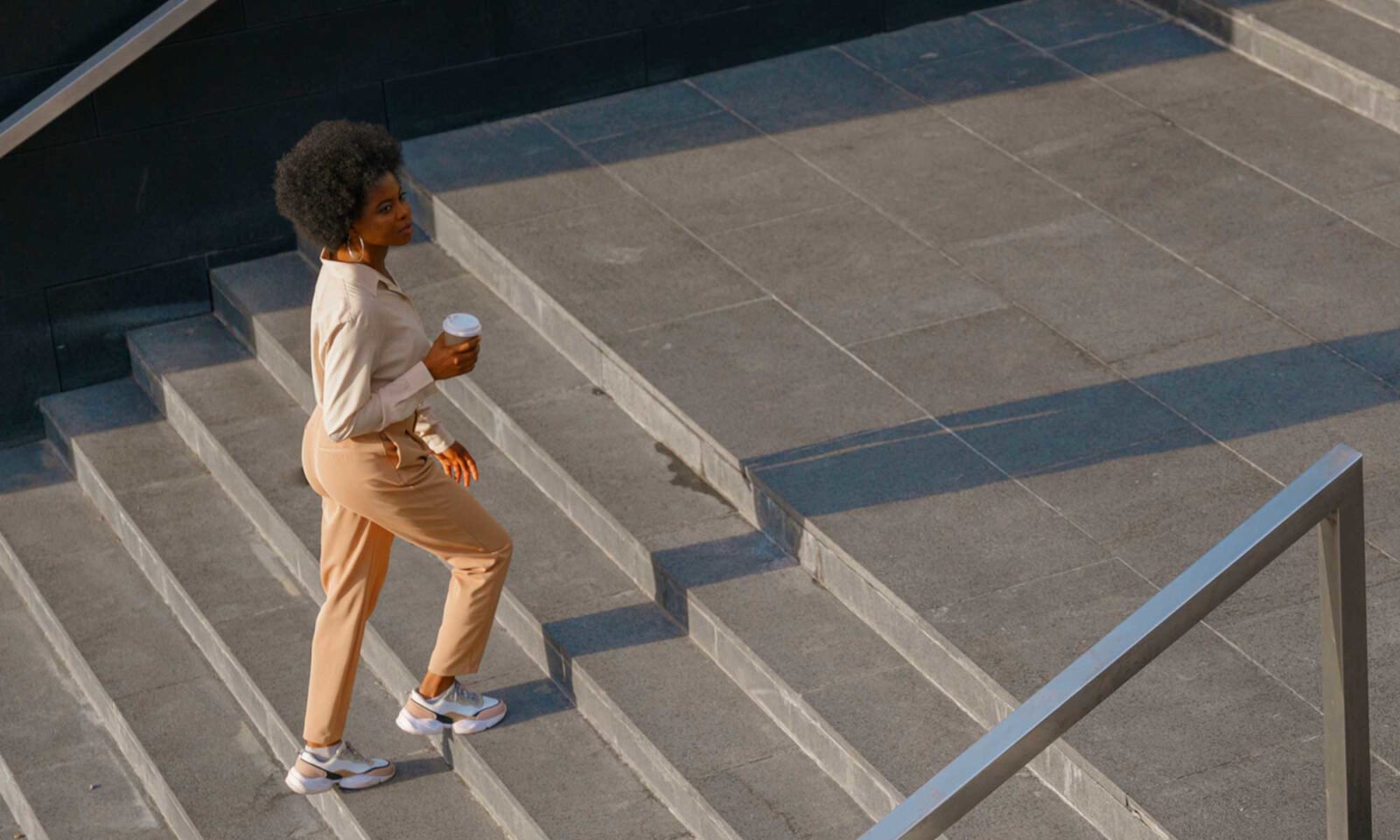 A person engaging in light everyday movement, symbolizing improved cognitive function and a younger brain.