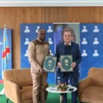 Drapeaux du Maroc et de la RDC symbolisant la coopération économique stratégique et le développement mutuel