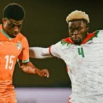 Côte d'Ivoire football team celebrating a goal during the AFCON 2025 match against Burkina Faso.