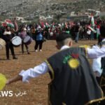 أكراد سوريون يرقصون ويحتفلون بعيد النوروز في منطقة عفرين.