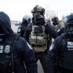 مبنى وزارة العدل الأمريكية مع إشارة إلى ولاية مينيسوتا