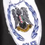 صورة لسيارات الشرطة وسيارات الإسعاف في موقع تفجير انتحاري في حلب، سوريا، مع تواجد أمني مكثف.
