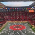 صورة لملعب كرة قدم في المغرب يرمز لاستضافة كأس أمم إفريقيا 2025 والأثر الاقتصادي للحدث.