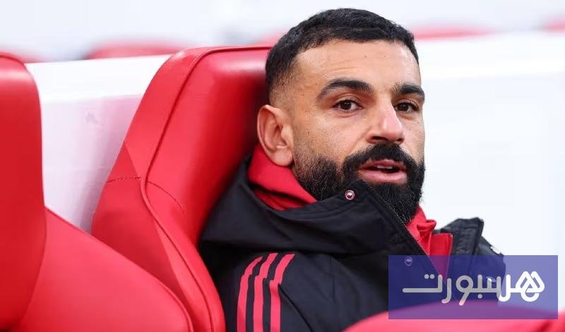 صورة لمحمد صلاح وهو يبتسم، تعكس نجاحه الرياضي والاقتصادي في المملكة المتحدة.