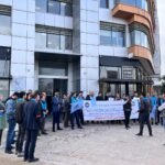 صورة توضيحية لمقر الوكالة الوطنية للتأمين الصحي أو وثائق مالية