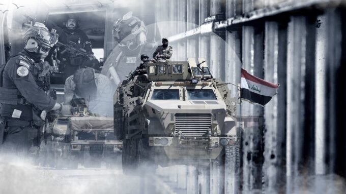 صورة لمعتقلي داعش يتم نقلهم تحت حراسة أمنية مشددة بين سوريا والعراق.