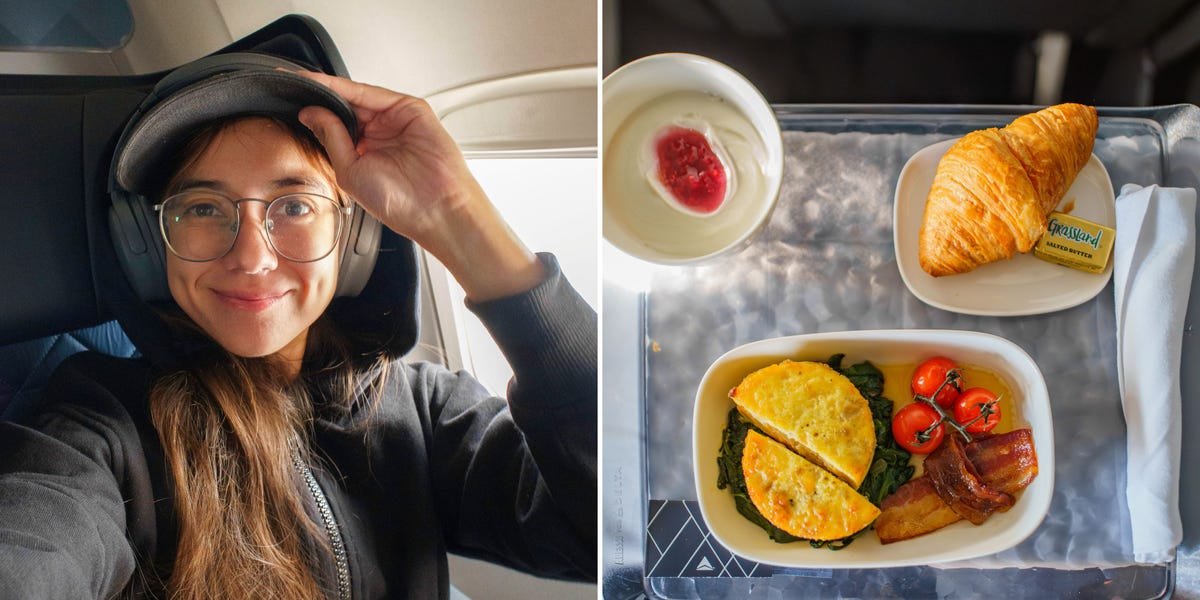 A passenger enjoying the spacious and luxurious Delta First Class cabin with a meal and entertainment.