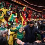 Vue aérienne du complexe sportif Prince Moulay Abdellah à Rabat, avec le logo de la DGSN en surimpression.