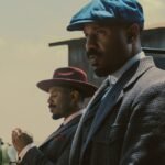 A diverse group of people watching a movie in a theater, symbolizing the broad appeal of inclusive storytelling.