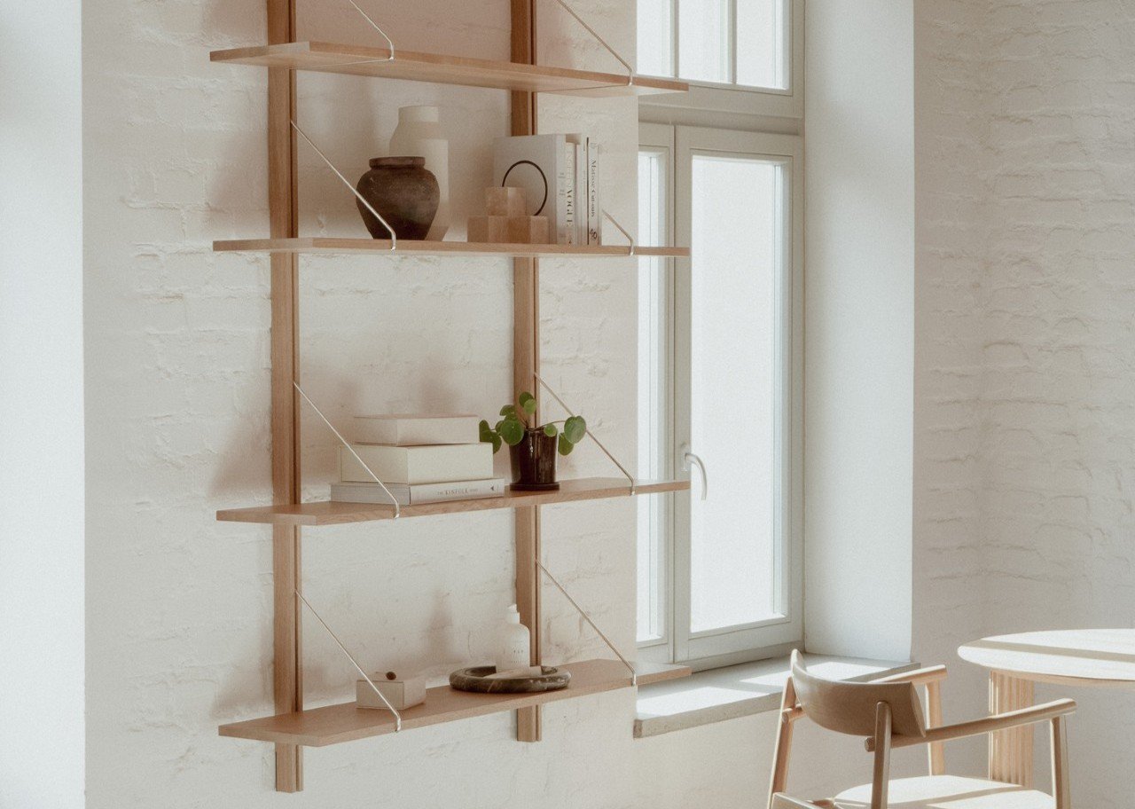 TAMO's RODD and LIGO: Crafting Calm and Clarity Through Elevated Storage Design 3 TAMO RODD and LIGO collections showcasing elegant oak and steel storage solutions in a modern interior.