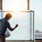 An entrepreneur confidently navigating complex challenges, symbolizing the power of real-world experience over academic knowledge.