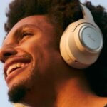 Fender Mix wireless headphones in Olympic White and Skyscraper Black, highlighting their sleek design and modular components.