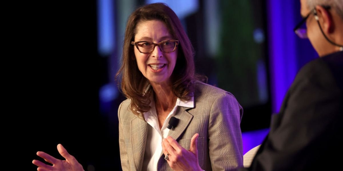 Fidelity Digital Dollar (FIDD) logo against a backdrop of digital currency symbols