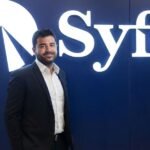 A graphic illustrating the shift from cash savings to diverse investments in Asia, with fintech platforms like Syfe at the forefront.