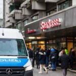 Forensic investigators examining a breached bank vault in Germany after a multi-million euro heist.