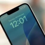 The new iPhone 16e, a key driver in Apple's ascent to the top of the global smartphone market, pictured in a professional setting.