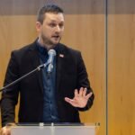 Greenland Prime Minister Jens-Frederik Nielsen at a press conference in Nuuk, discussing national sovereignty and geopolitical tensions.