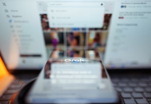 Grok AI chatbot interface on X (formerly Twitter) with xAI branding, symbolizing its controversial integration and rapid growth.