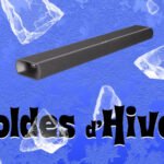 Barre de son Harman Kardon Enchant 900 élégante sous un téléviseur, offrant un son immersif