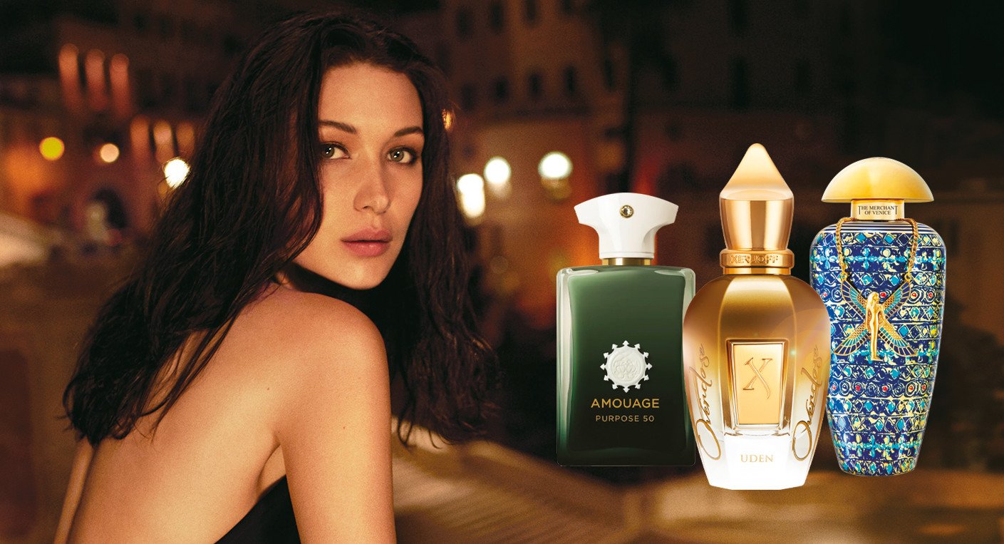 Flacons de parfums de luxe exposés, symbolisant l'art et la richesse des matières premières olfactives.