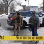 ICE agents standing guard after a fatal shooting in Minneapolis
