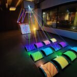 Todd Moyer's Illoominated II interactive light installation, featuring laser threads and quantum tapestry illusion.