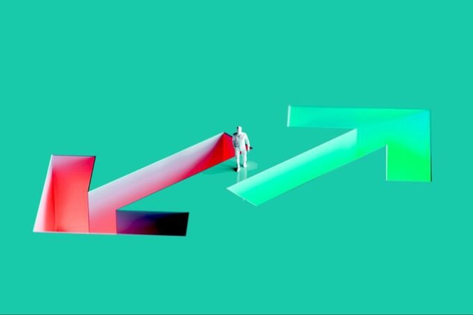 A person looking at a compass, symbolizing intuition guiding decisions in a stormy landscape.