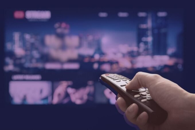 A collage of film reels and financial charts, symbolizing the intersection of documentaries and investment wisdom.