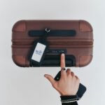 July CaseSafe smart suitcase in a signature color, showcasing its sleek design and integrated tracking lock.