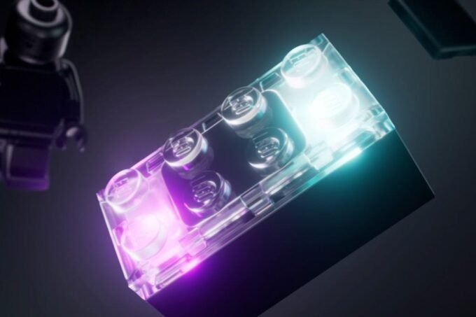 A close-up image of the new Lego Smart Brick, a 2x4 brick with integrated technology, possibly glowing or interacting with a Star Wars minifigure.