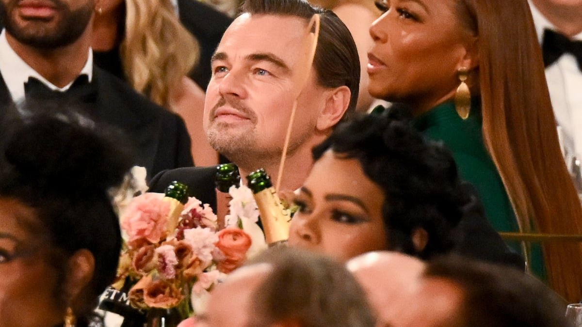 Leonardo DiCaprio animatedly speaking at the 2026 Golden Globes