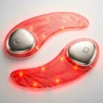 L'Oréal's transparent, flexible LED Eye Mask in a sleek carrying case, showcasing its innovative design and glowing red.