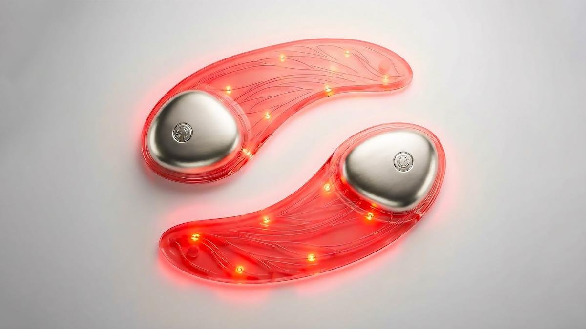 L'Oréal's transparent, flexible LED Eye Mask in a sleek carrying case, showcasing its innovative design and glowing red.