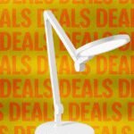 Lume Cube Edge Light 2.0 illuminating a modern home office desk with a laptop and monitor.