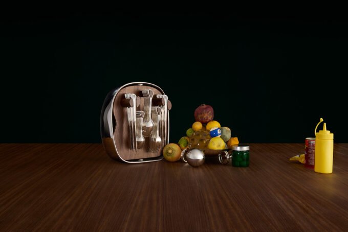 The Carrousel Flatware collection by Charlotte Chesnais and Maison Christofle, displayed in its elegant bi-colour metal and wood sculptural case.