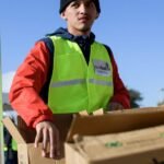 A grocery cart with expensive items like red meat and whole milk, juxtaposed with cheaper processed foods, symbolizing the dietary divide created by MAHA's new guidelines.