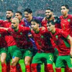 Joueurs des équipes du Maroc et du Nigeria s'affrontant lors d'un match de football de la CAN.