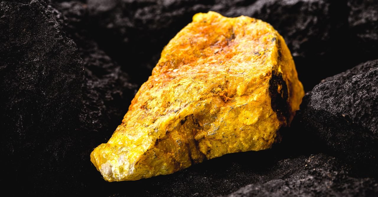 Meta logo superimposed on an abstract image of a nuclear power plant, symbolizing technological investment in advanced energy.