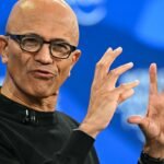 Microsoft CEO Satya Nadella gestures while speaking at the World Economic Forum in Davos, Switzerland.