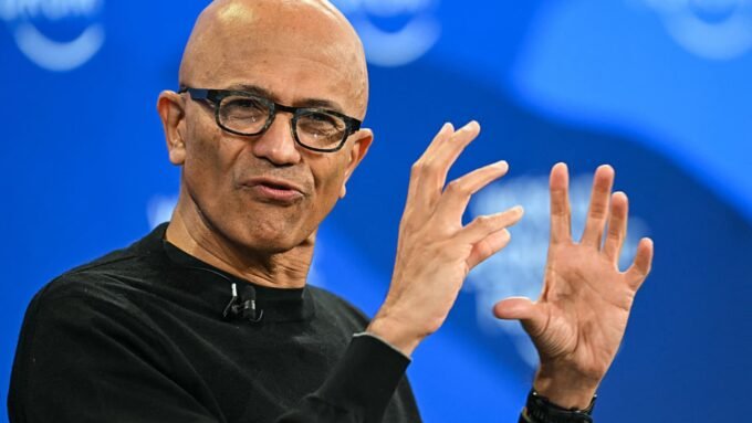 Microsoft CEO Satya Nadella gestures while speaking at the World Economic Forum in Davos, Switzerland.