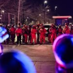 Demonstrators protest outside the Whipple federal building in Minneapolis, Minnesota, amidst federal occupation.