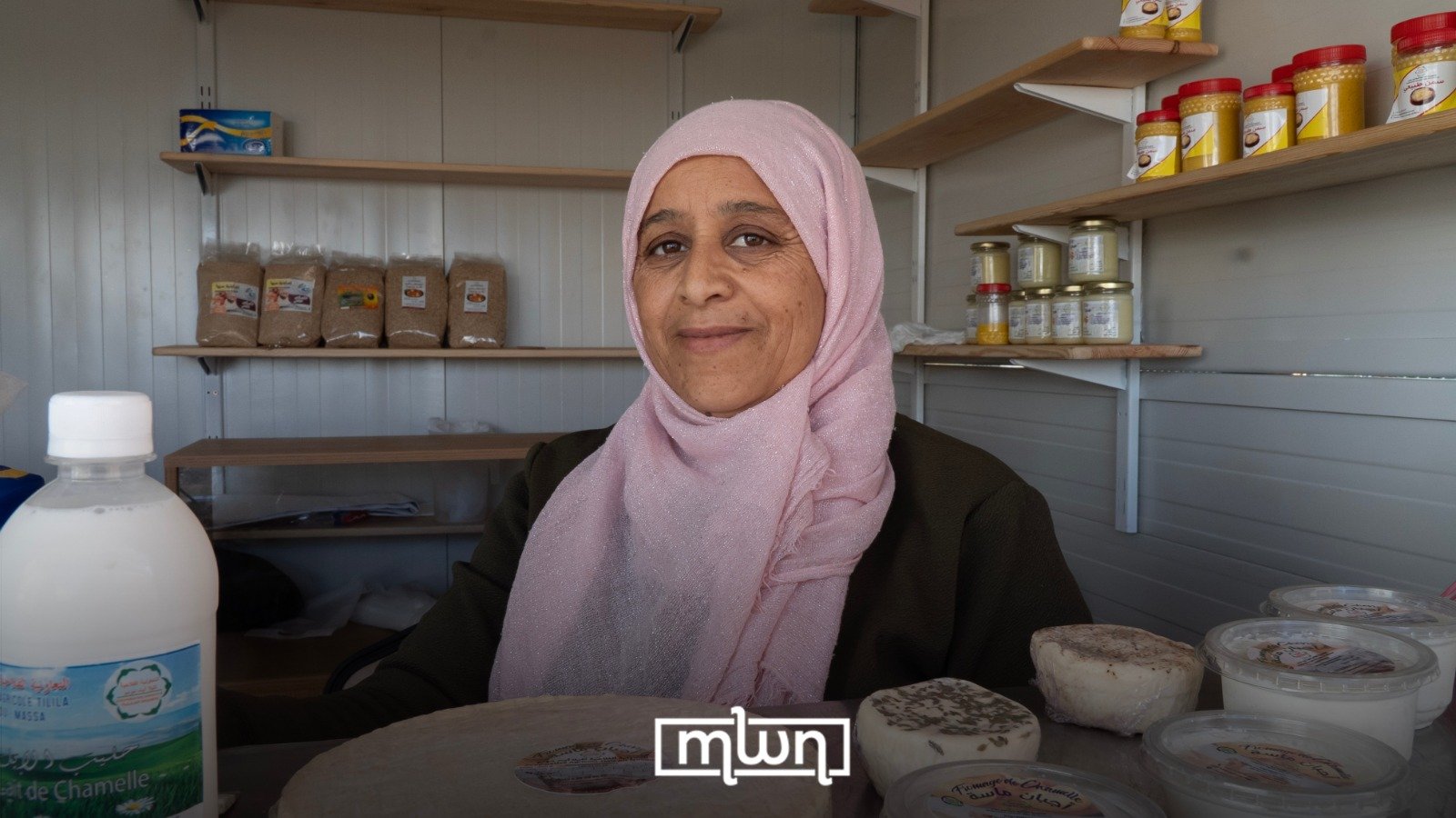 Naima Hani, president of Tilila Ait Moumo Cooperative, presenting artisanal goat dairy products at the International Argan Fair.