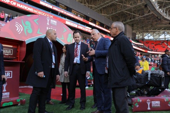 FBI delegation members observing security protocols at Moulay Hassan Stadium in Rabat, Morocco, during their AFCON 2025 security study visit.