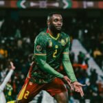 Morocco and Cameroon national football teams in action during an AFCON 2025 match.