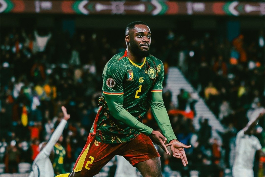 Morocco and Cameroon national football teams in action during an AFCON 2025 match.