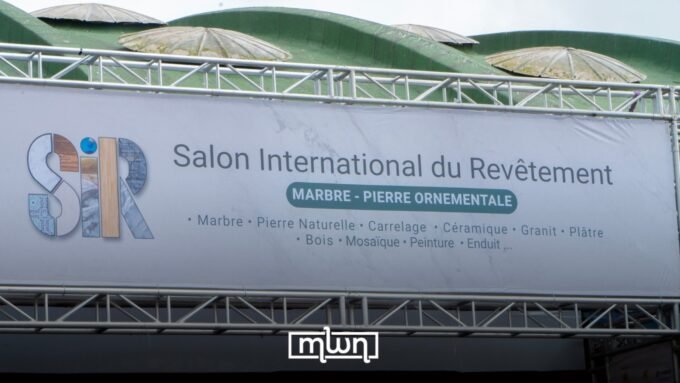 Attendees at the International Coating and Finishing Trade Fair in Casablanca, showcasing construction materials and finishes.